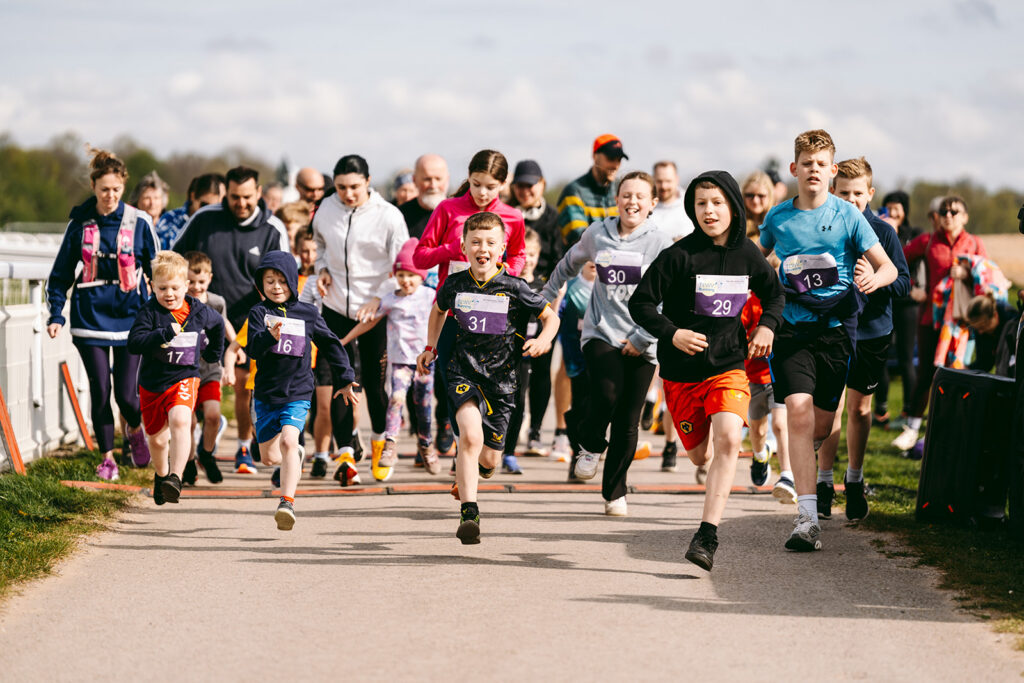 Runners at the 2025 TEWV 10k, York Racecourse.