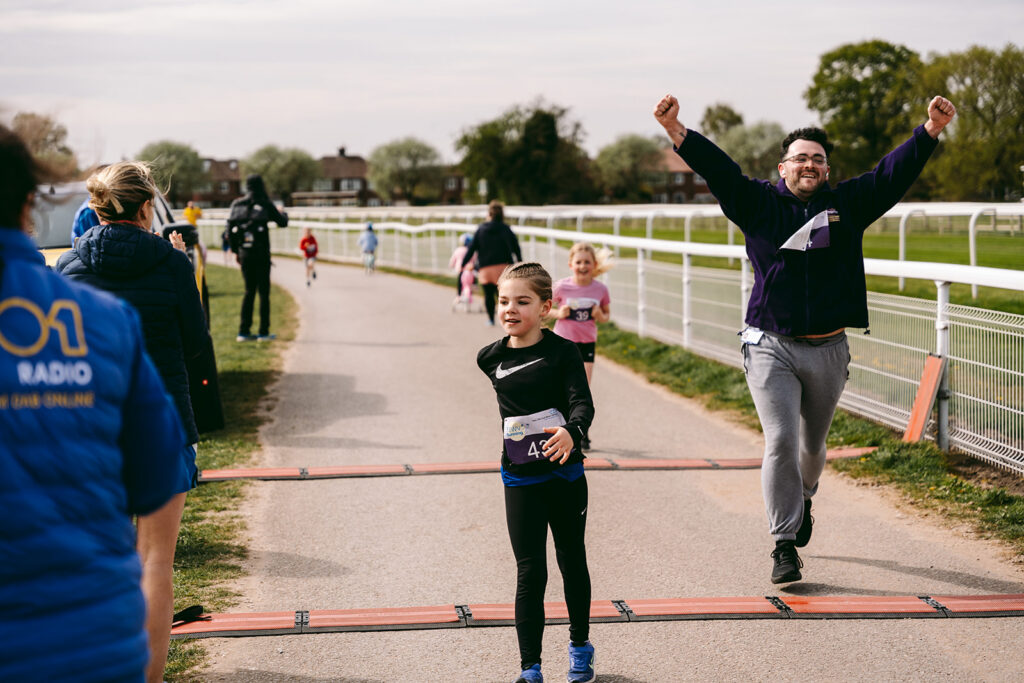 Runners at the 2025 TEWV 10k, York Racecourse.
