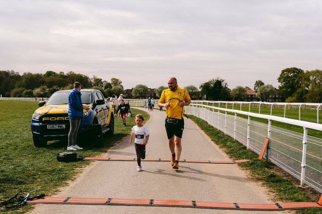Runners at the 2025 TEWV 10k, York Racecourse.