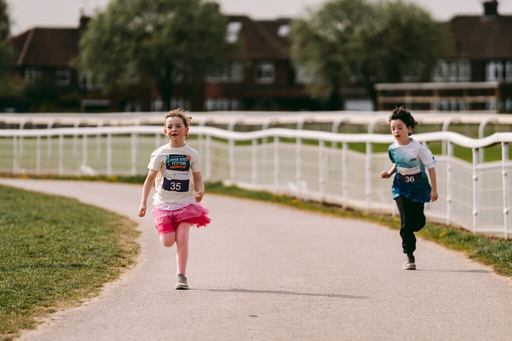 Runners at the 2025 TEWV 10k, York Racecourse.