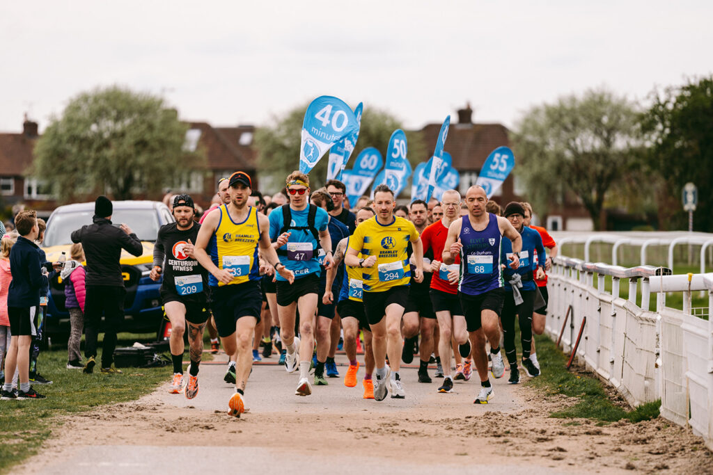 Runners at the 2025 TEWV 10k, York Racecourse.