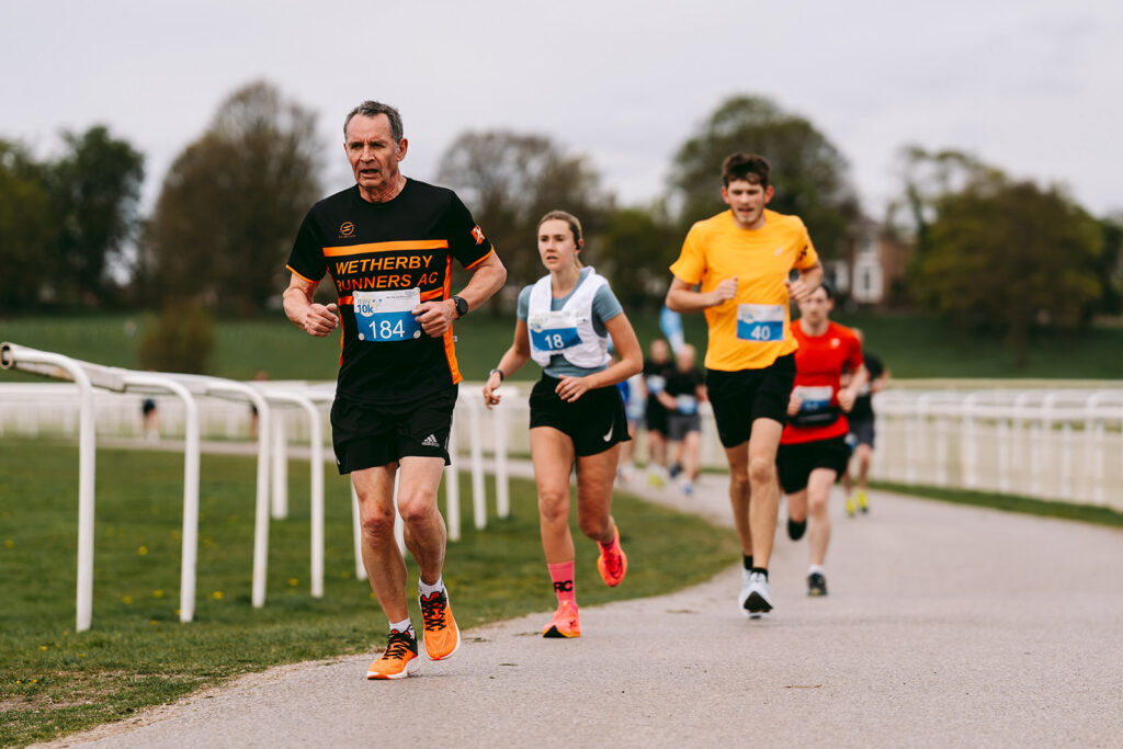Runners at the 2025 TEWV 10k, York Racecourse.