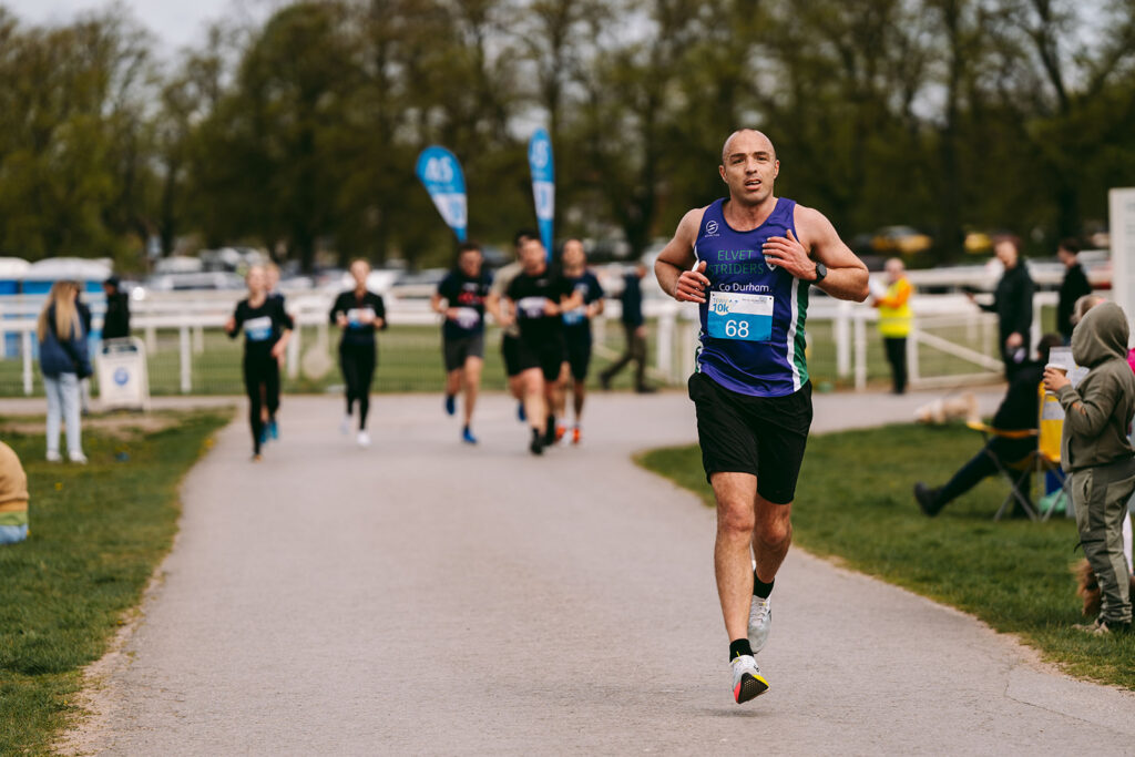 Runners at the 2025 TEWV 10k, York Racecourse.